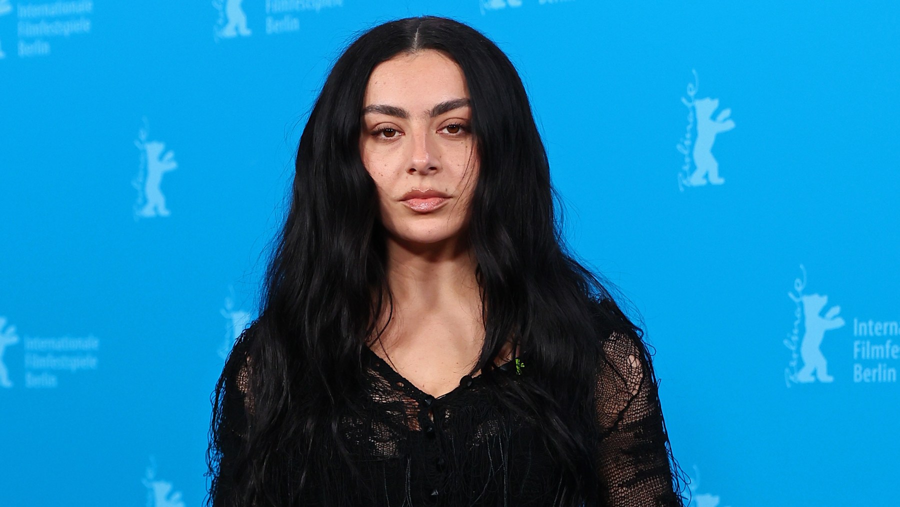 BERLIN, GERMANY - FEBRUARY 14: Charli xcx poses at the "The Moment" photocall during the 76th Berlinale International Film