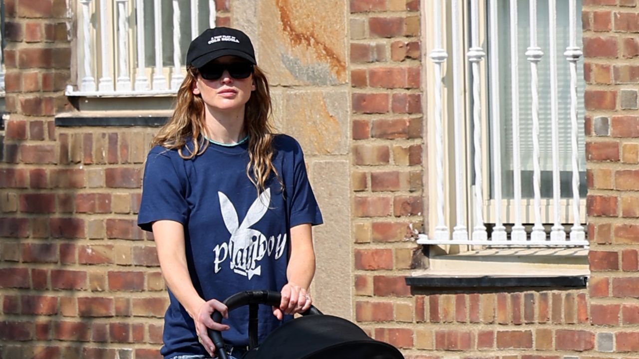 Jennifer Lawrence Wears Denim Bermuda Shorts and Graphic Tee in New York