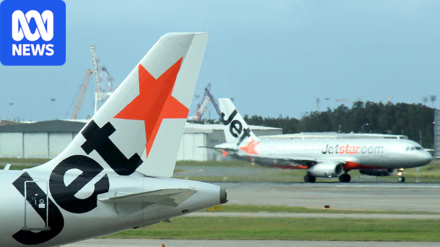 Two Jetstar planes on the tarmac